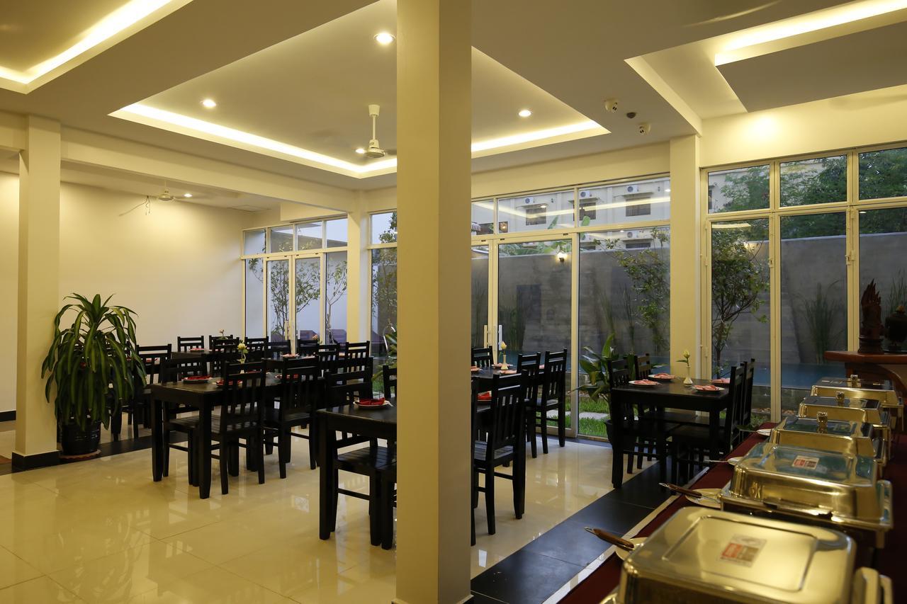 Holy Angkor Deluxe Hotel Siem Reap Bagian luar foto