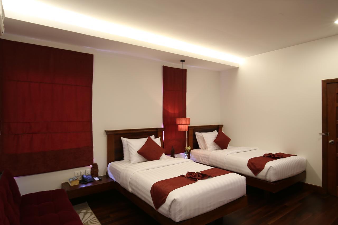 Holy Angkor Deluxe Hotel Siem Reap Bagian luar foto