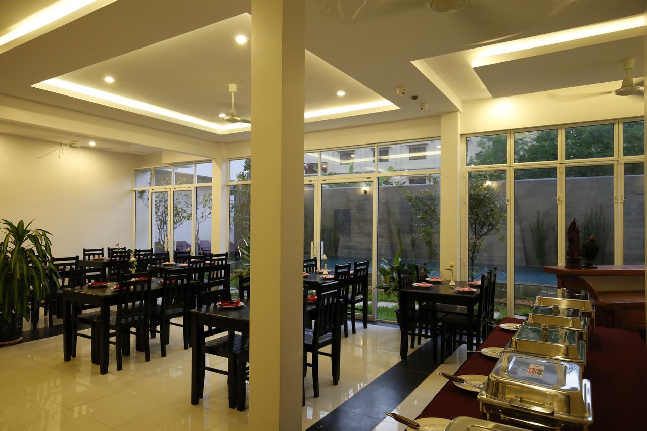 Holy Angkor Deluxe Hotel Siem Reap Bagian luar foto